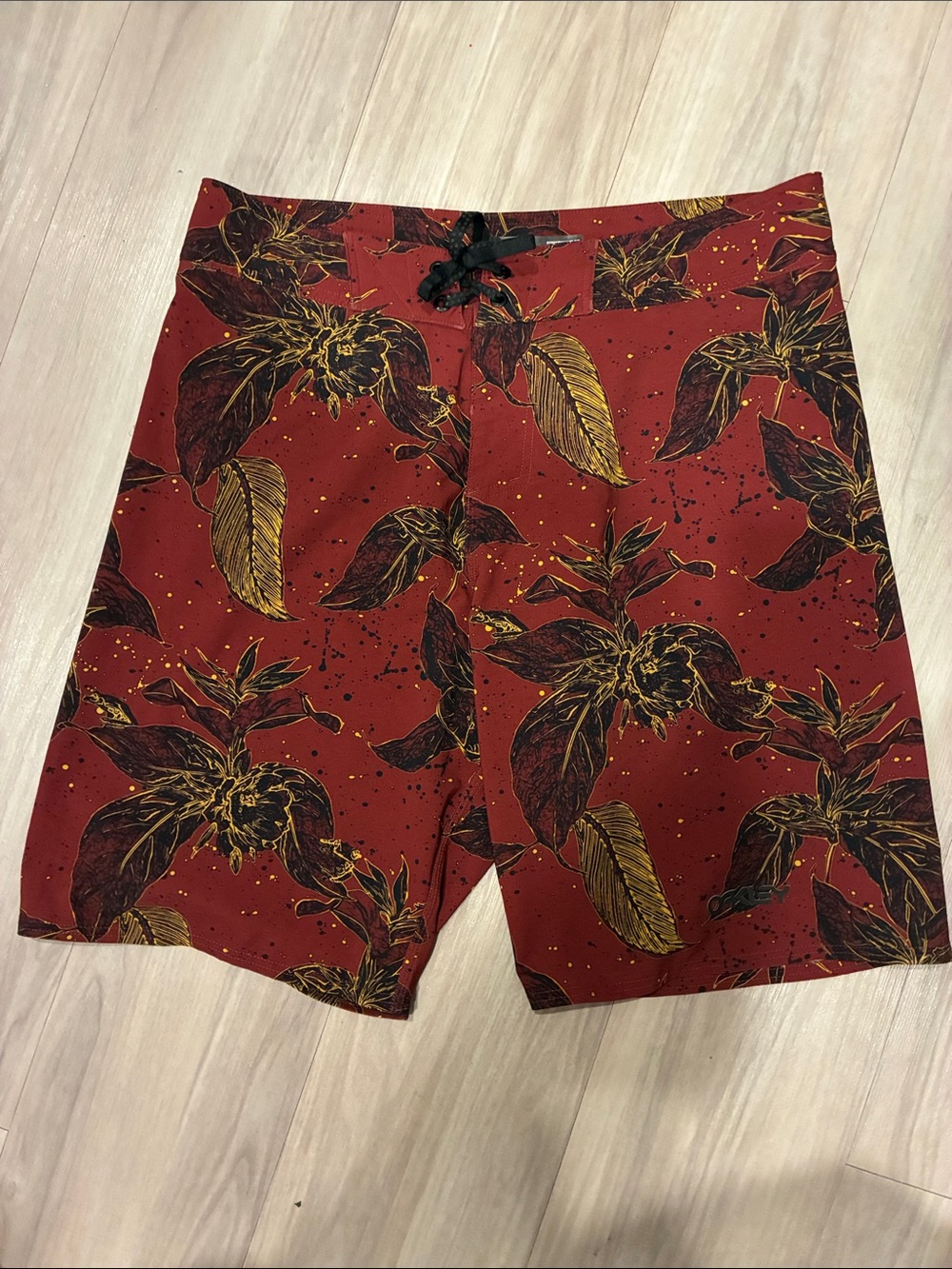 Oakley Red Floral Swim Board Shorts with Black Drawstring
